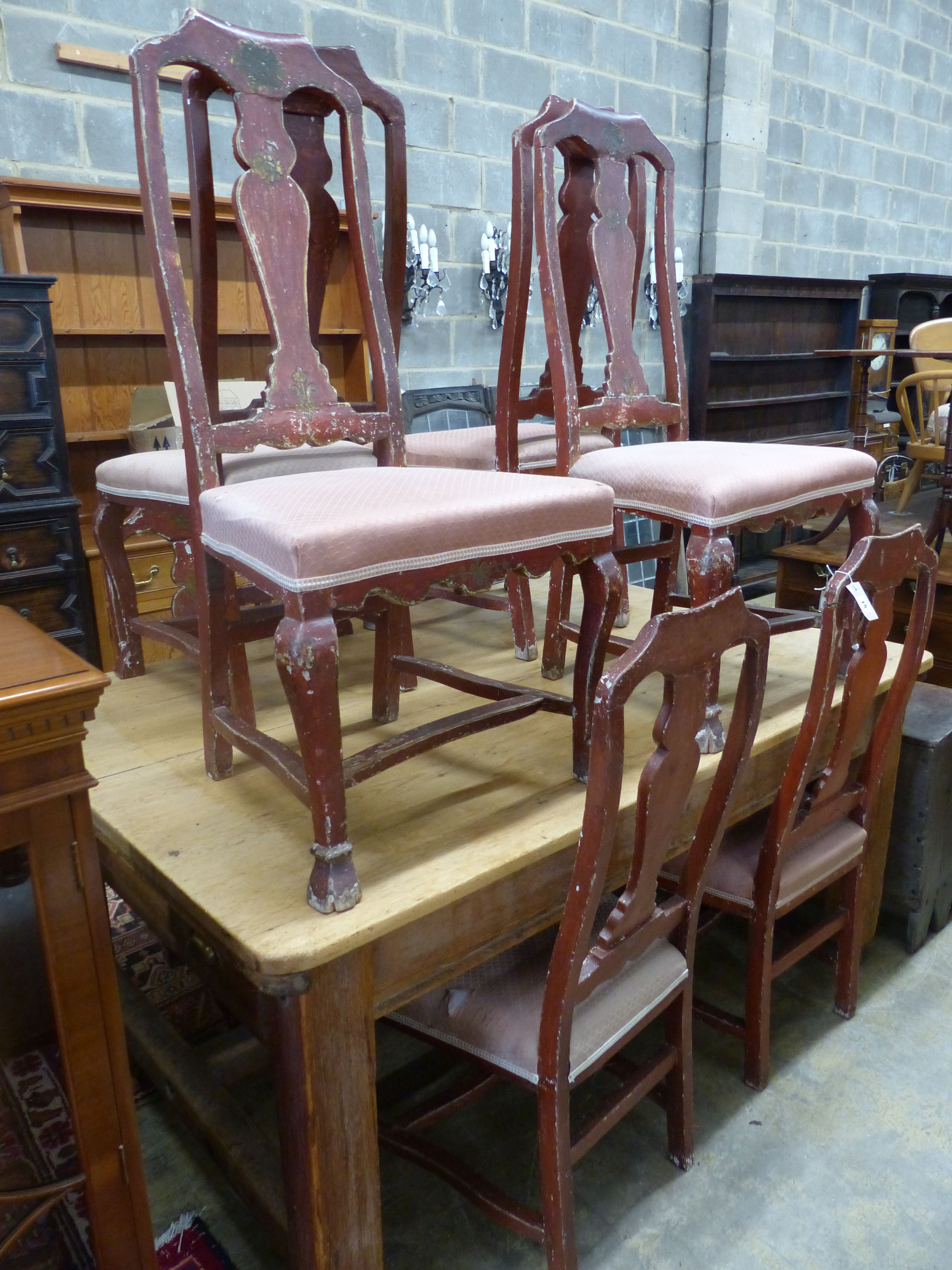 A set of eight Dutch red painted dining chairs